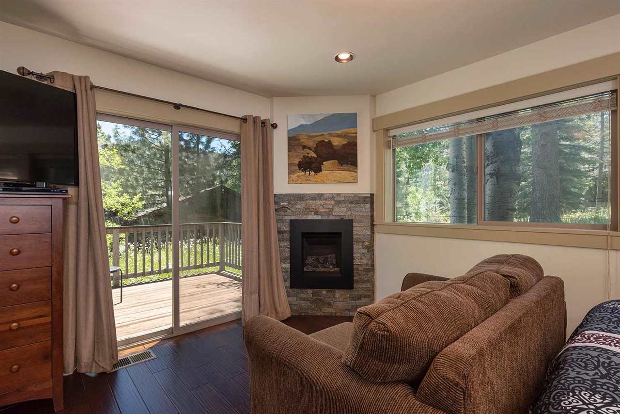 Gas fireplace and sitting area in the Palisades Tahoe Studio — cozy retreat near Palisades Tahoe